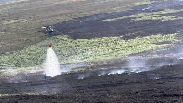 Helicopter drops water on gorse fire in the Glencree/Featherbed mountain area on the Wicklow-Dublin border