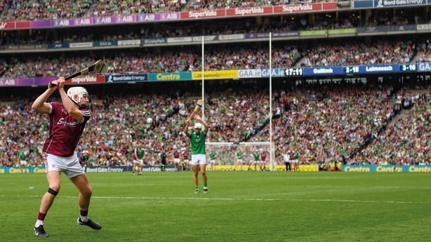 A 45-year wait hinging on one strike. Eight minutes of injury time are called, Galway fight back like true championsto trail by just a point, and at the death Joe Canning standsoer a free with the chance of drawing his team level. However, the distance proves too great and Limerick are the 2018 All-
