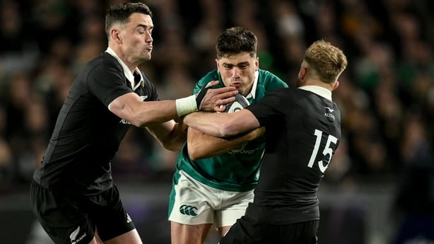 18 July 2026; Jimmy O'Brien of Ireland is tackled by Will Jordan, left, and Damian McKenzie of New Zealand during the 2026 Nations Championship Round 3 match between New Zealand and Ireland at Eden Park in Auckland, New Zealand. Photo by Brendan Moran/Sportsfile