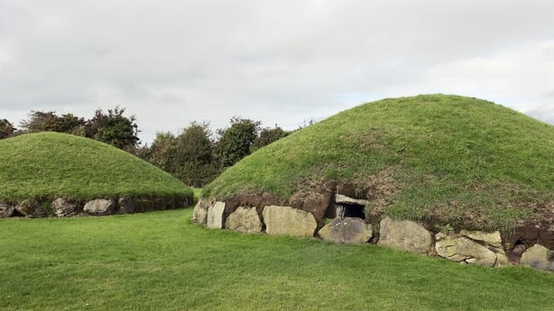 Two stone edged burial mounds at Knowth a Neolithic or New Stone Age burial site in County Meath that contains one of the three great Irish passage tombs of the Bru Na Boinne complex in eastern Ireland About 5000 years old