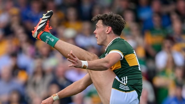 5 May 2024; David Clifford of Kerry kicks a point during the Munster GAA Football Senior Championship final match between Kerry and Clare at Cusack Park in Ennis, Clare. Photo by Brendan Moran/Sportsfile