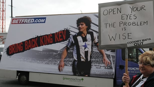 Newcastle United supporters protest against club owner Mike Ashley