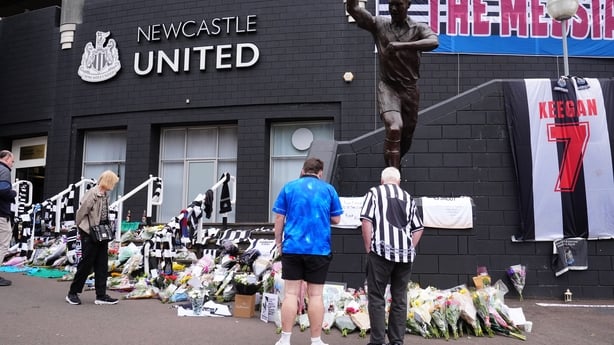People observe the tributes at St James' Park, Newcastle for former Liverpool star and Newcastle and England manager Kevin Keegan