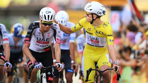 VOIRON, FRANCE - JULY 22: (L-R) Felix Grossschartner of Austria and Tadej Pogacar of Slovenia and UAE Team Emirates - XRG - Yellow Leader Jersey cross the finish line during the 113th Tour de France 2026, Stage 17 a 174.7km stage from Chambery to Voiron / #UCIWT / on July 22, 2026 in Voiron, France.