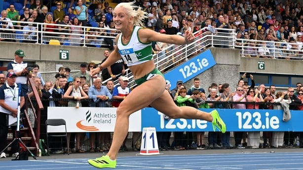 Sarah Lavin of Emerald AC, Limerick, crosses the line to win the senior women's 100m hurdles final during day two of the 153rd 123.ie National Track & Field Senior Championships at Morton Stadium in Dublin