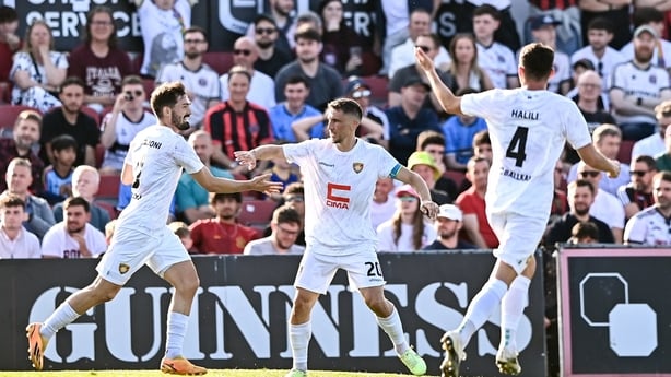 22 July 2026; Toni Domgjoni of Ballkani, left, celebrates with teammate Edvin Kuč after scoring their side's first goal, a penalty, during the UEFA Conference League Second Qualifying Round first leg match between Bohemians and Ballkani at Dalymount Park in Dublin. Photo by Ben McShane/Sportsfile