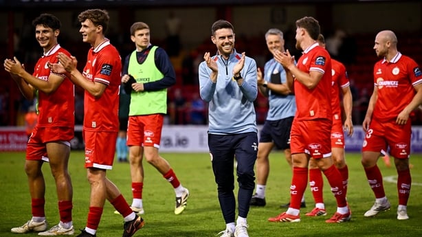 23 July 2026; Shelbourne head coach John Russell, centre, with his players after the UEFA Conference League Second Qualifying Round first leg match between Shelbourne and Kalju at Tolka Park in Dublin. Photo by Seb Daly/Sportsfile