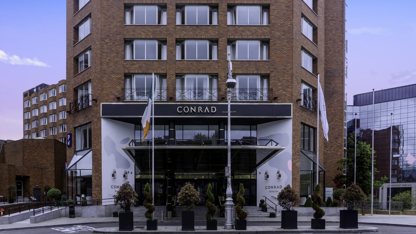 NFL game helped Conrad Hotel to almost double profiits