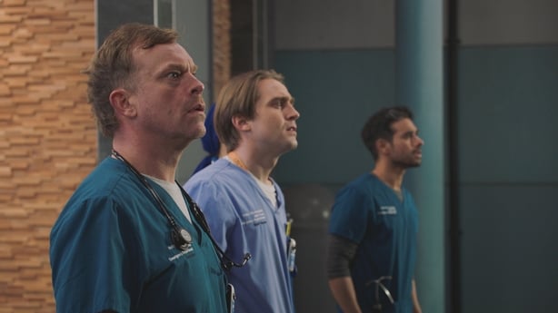 Dylan Keogh (William Beck), Cam Mickelthwaite (Barney Walsh), and Rash Masum (Neet Mohan) look on. Photo: BBC Studios