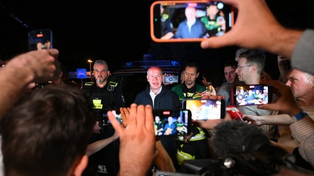 Berlin's mayor Kai Wegner speaks to the media near the scene where one person was killed and around 15 injured after a car is believed to have hit the crowd on the outskirts of the Christopher Street Day (CSD) parade in Berlin, on July 25, 2026. "We believe that a vehicle entered the Tiergarten park