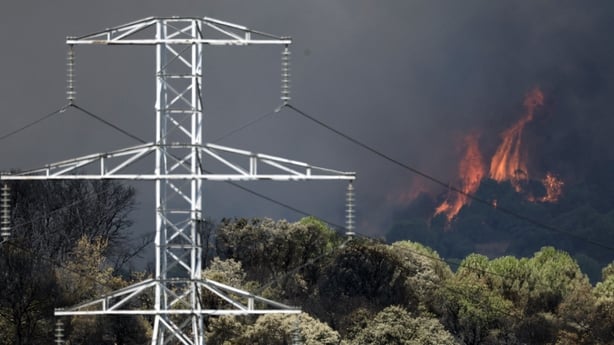 A wildfire burns a forest area near Pelayos de la Presa, 65km west of Madrid