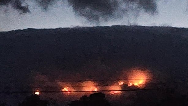 A mountain blaze at night time