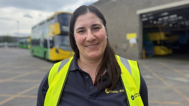 Dublin Bus driver Natalia Stratan standing at a garage