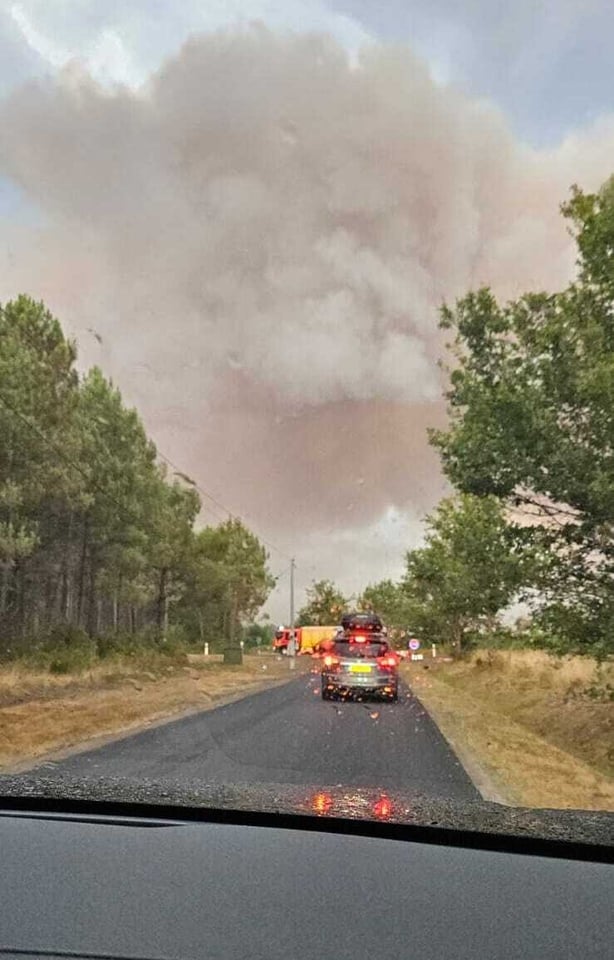 Smoke over the road while James Halford and his family were evacuating their campsite in Biscarosse, France