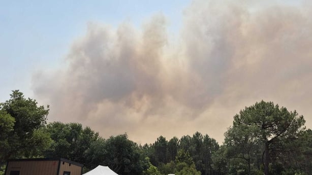 Smoke seen over the campsite while James Halford and his family evacuating from the wildfire in Biscarosse, France