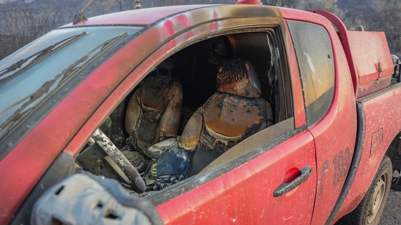 Wildfire rages on Crete as winds hamper firefighting