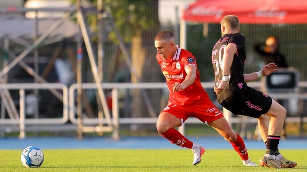 Evan Caffrey of Shelbourne in action against Maksim Podholjuzin of Kalju - Conference League, July 2026