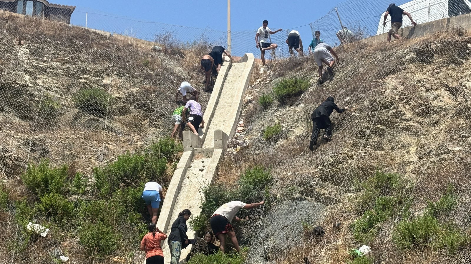 Migrants break through Spanish border, military deployed