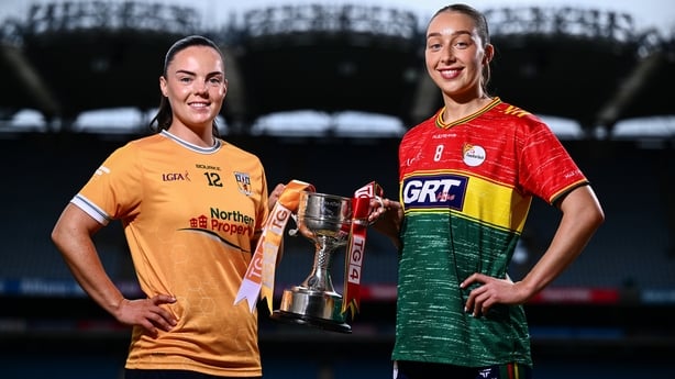 29 July 2026; Antrim footballer Bronagh Devlin, left, and Carlow footballer Róisín Bailey pose for a portrait with The West County Hotel Cup during a photocall at Croke Park ahead of the 2026 TG4 All-Ireland Ladies Football Junior Championship Final between Antrim and Carlow this Sunday at Croke Par