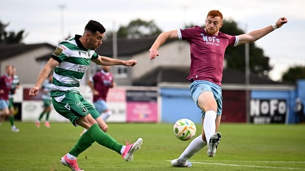 Aaron Greene of Shamrock Rovers (L) in action against James Bolger of Drogheda United - Premier Division, July 2026