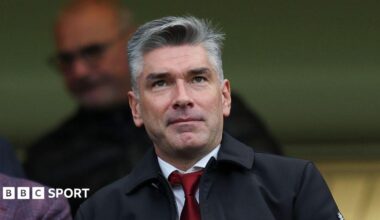 Richard Hughes at a Liverpool game