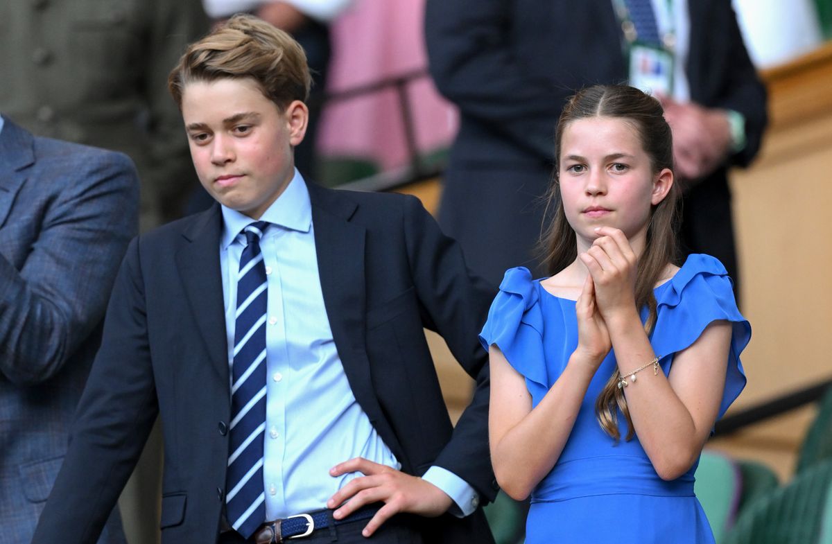 Princess Charlotte and Prince George shared a sibling moment while watching the Wimbledon men's final from the Royal Box.