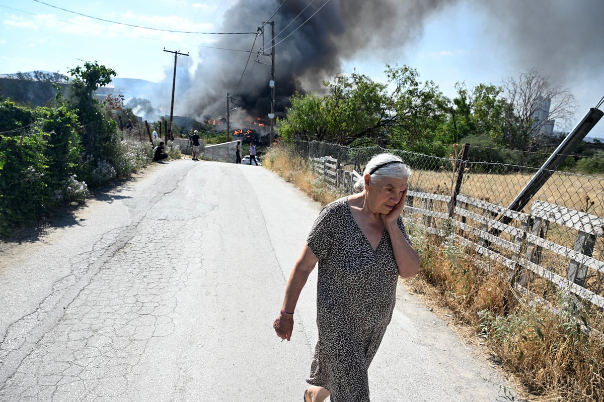 Tourist spots across Europe hit by wildfires as Greece warns of toxic smoke