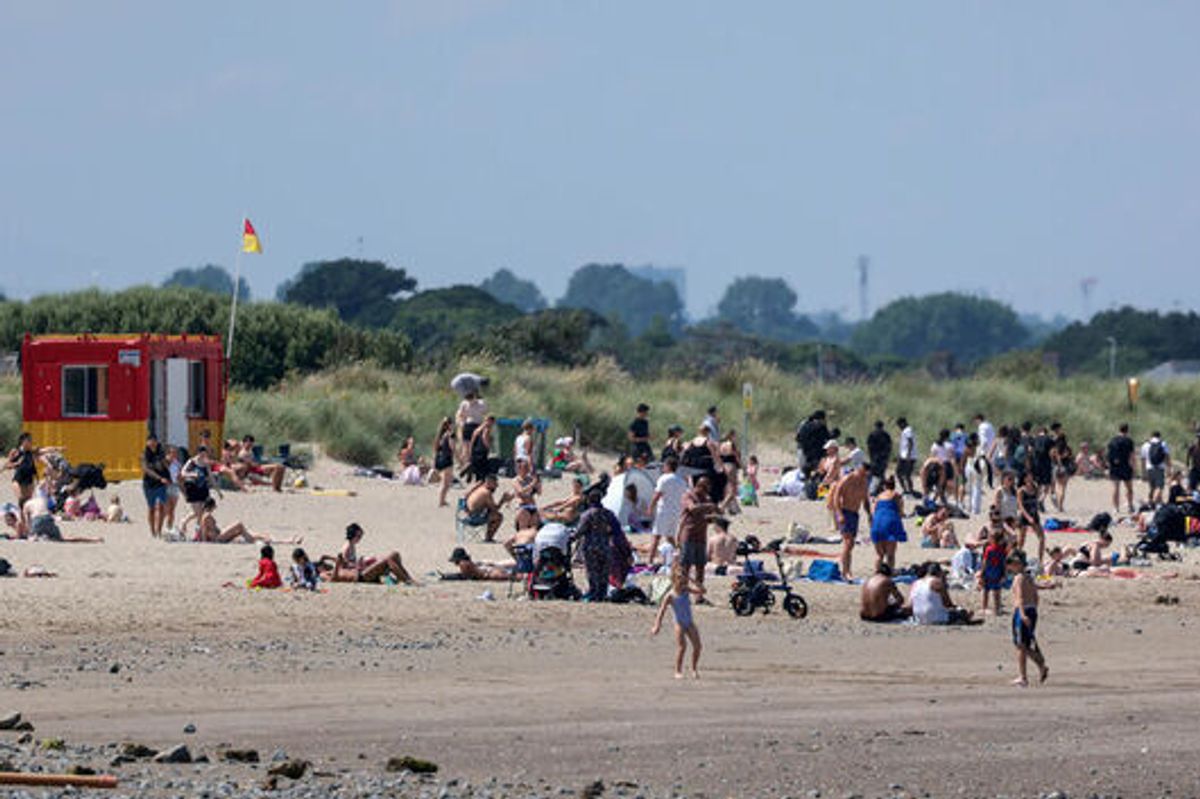 Beach goers pictured this afternoon enjoying the glorious sunshine on Burrow Beach in Dublin.....Picture Colin Keegan, Collins, Dublin.