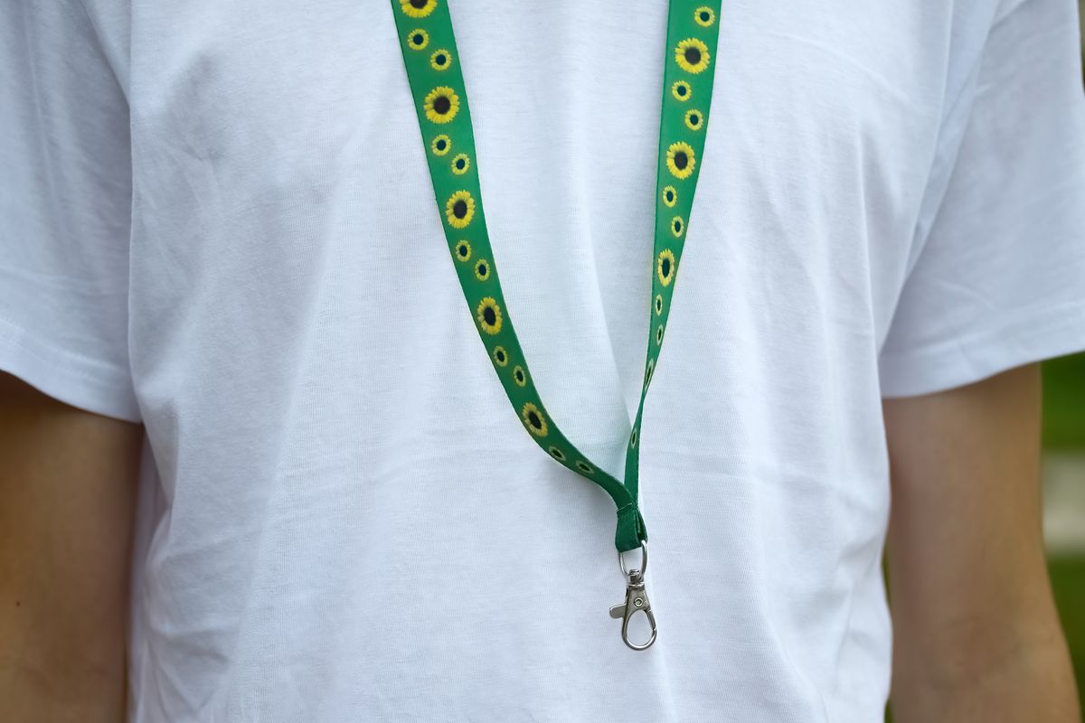 Sunflower lanyard, a symbol of people with invisible or hidden disabilities.