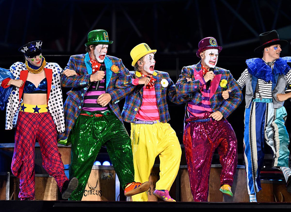 Howard Donald, Mark Owen and Gary Barlow of Take That perform live on stage during the "The Circus Live" stadium tour at The London Stadium on June 26, 2026 in London, England
