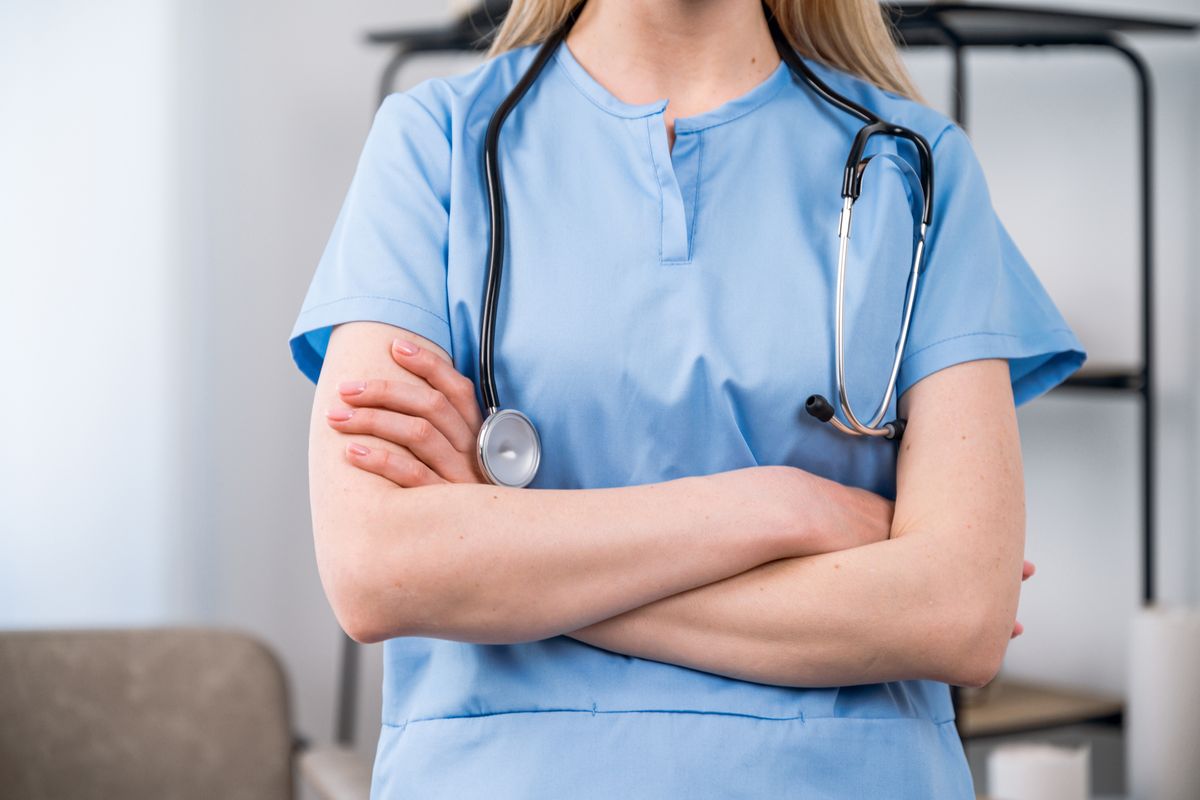 A nurse in scrubs