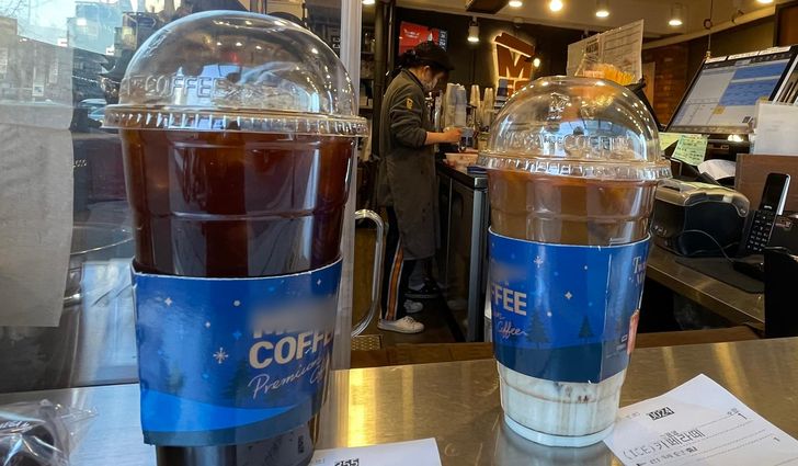 A coffee cup made of single-use plastic is pictured in use at a cafe in Seoul, Jan. 6, 2022. Yonhap