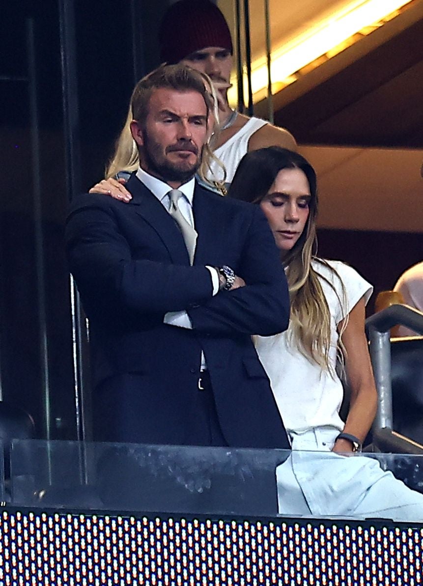 Victoria Beckham comforted her devastated husband last night