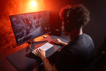 Gamer using Cherry XTRFY K5 Pro TMR Compact keyboard