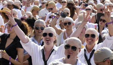 Count begins as Pitbull aims for record gathering of people wearing bald caps