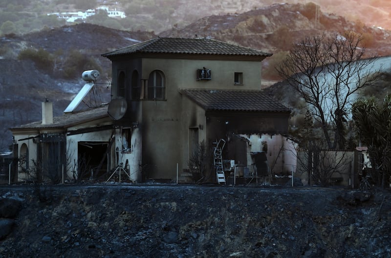 A fire-damaged house near Bedar. Photograph: Jose Jordan/AFP via Getty