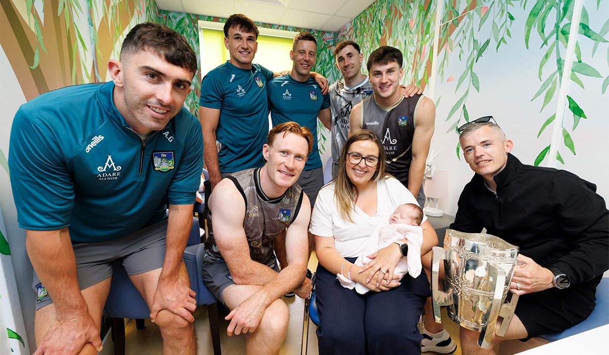 Pictured as the Limerick All Ireland Hurling Champions visit Crumlin Children’s Hospital with the Liam McCarthy Cup Sofia Dunne (3weeks) from Clondalkin with parents Colm and Karen. Pic: Andres Poveda