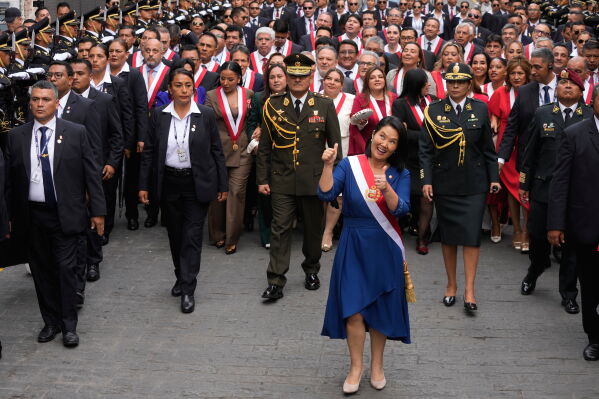 Peru's President Keiko Fujimori walks to the presidential palace after her inauguration in Lima, Peru, Tuesday, July 28, 2026. (AP Photo/Martin Mejia)