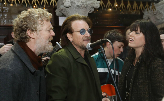 left-to-right-glen-hansard-bono-and-imelda-may-take-part-in-the-annual-christmas-eve-busk-on-grafton-street-dublin
