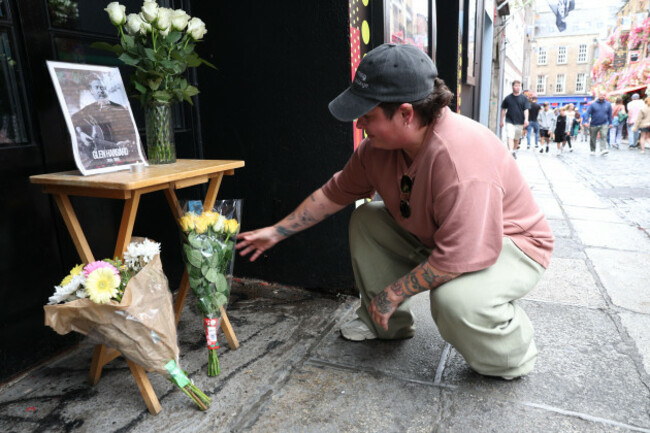 antonia-briones-leaving-flowers-in-temple-bar-dublin-in-tribute-to-oscar-winning-irish-musician-and-activist-glen-hansard-who-has-died-in-a-motorcycle-crash-on-lower-road-strawberry-beds-lucan-pic