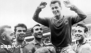 Just Fontaine being held up by his France team-mates at the 1958 World Cup