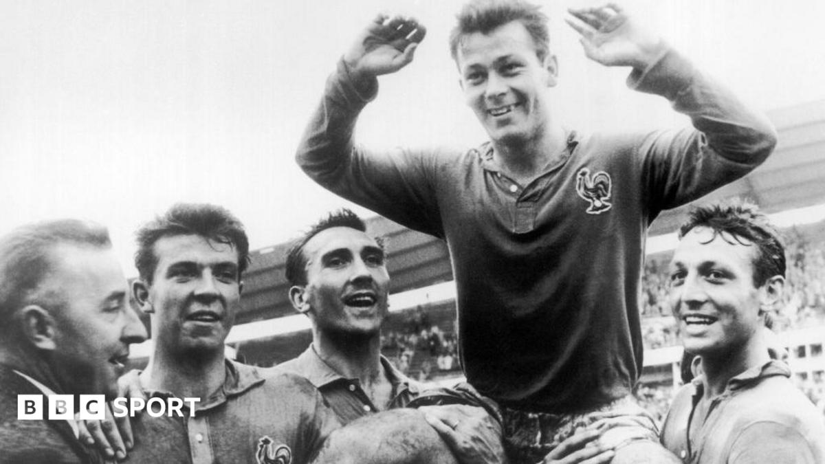 Just Fontaine being held up by his France team-mates at the 1958 World Cup