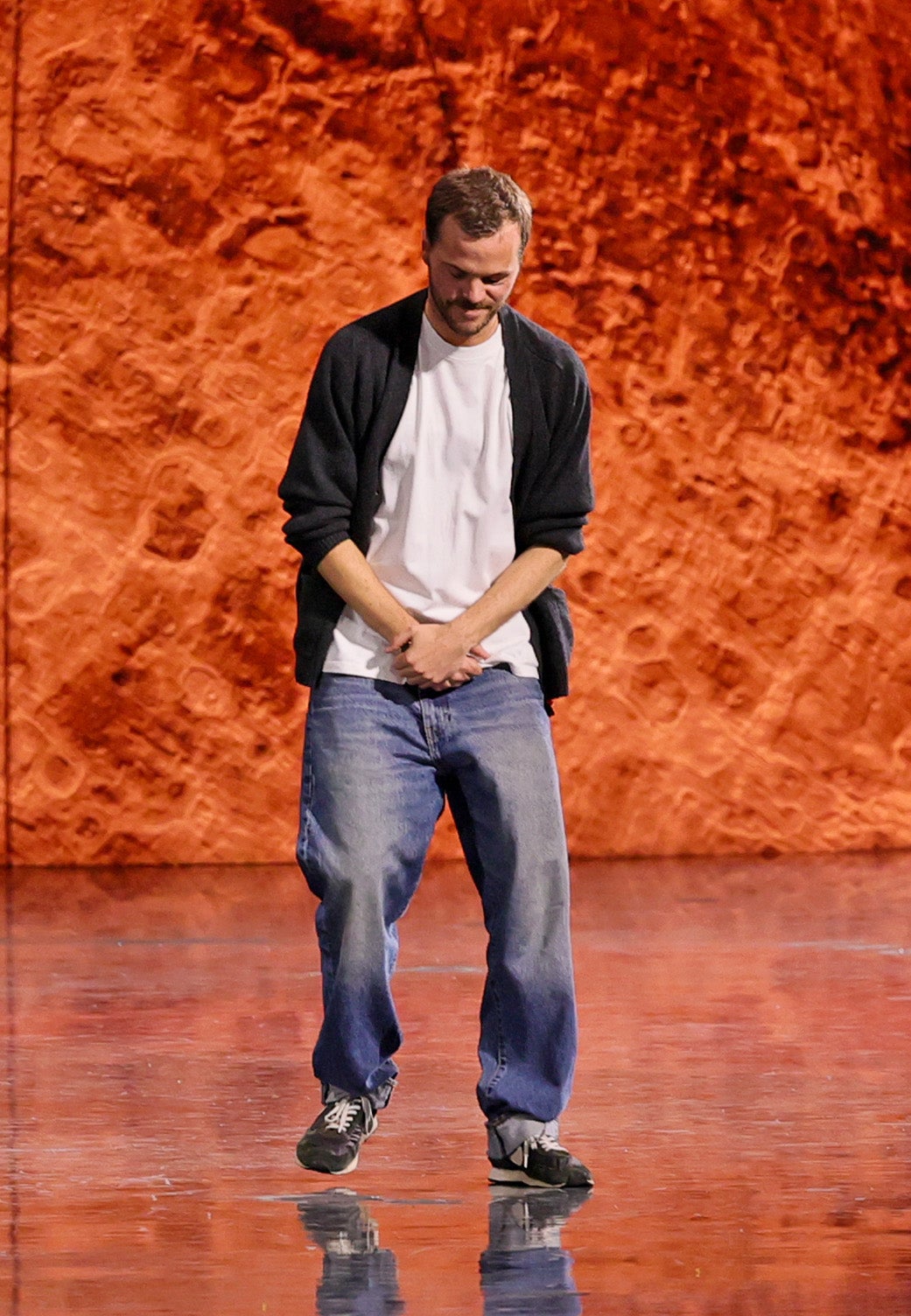 Blazy taking a bow after his debut Chanel runway show last October