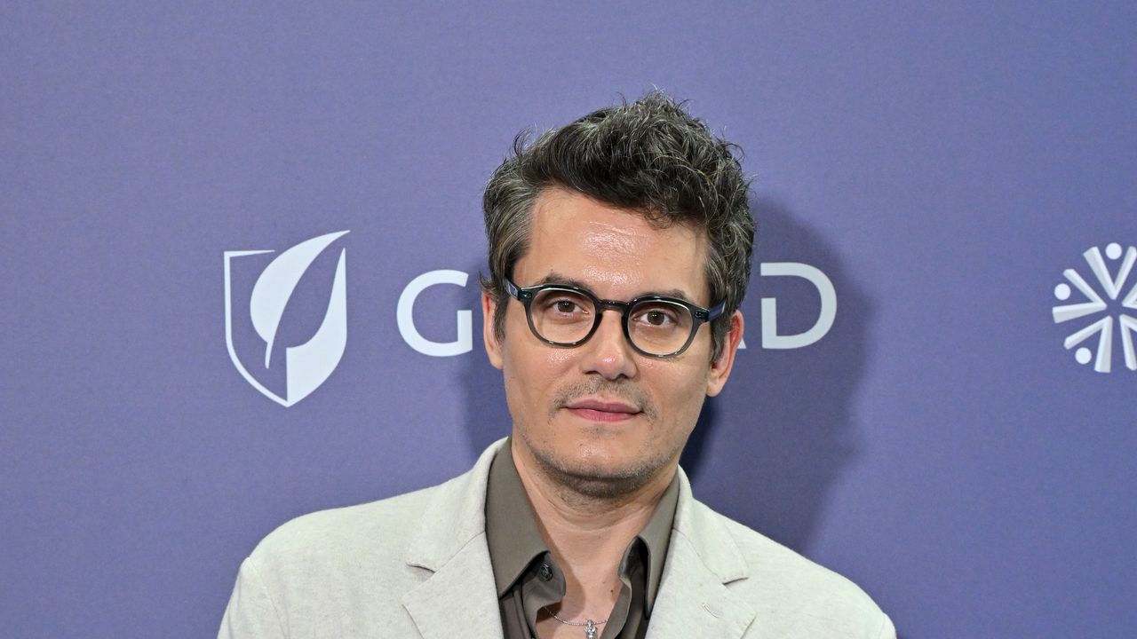 John Mayer Channeled Young Eric Clapton in a Breezy Summer Blazer