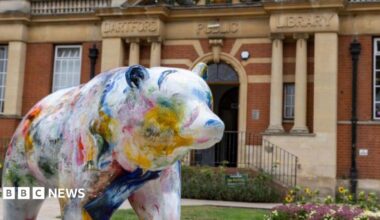 A colourful bear sculpture outside Dartford Public Library.