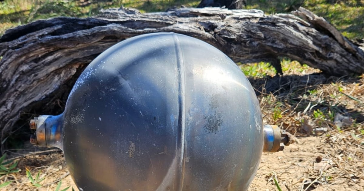 Metallic space balls found on Australian beach