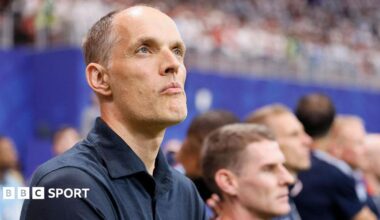 A close-up picture of England head coach Thomas Tuchel looking thoughtful on the touchline in the World Cup semi-final against Argentina