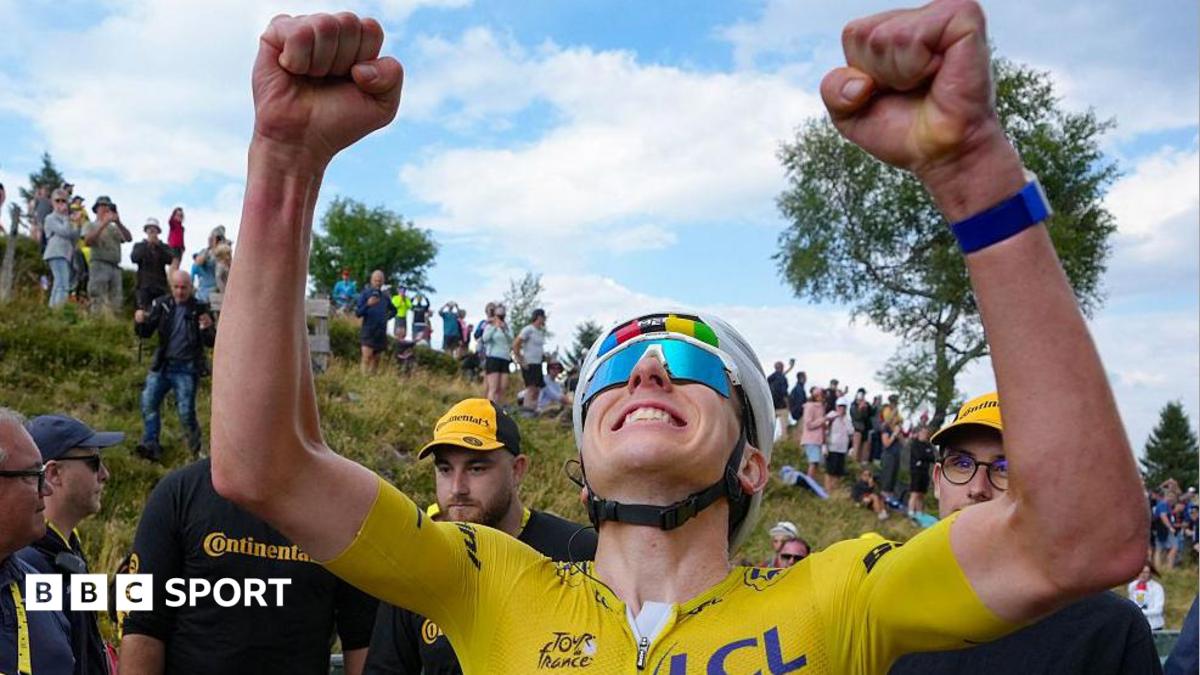 Tadej Pogacar celebrates winning stage 14 of the Tour de France