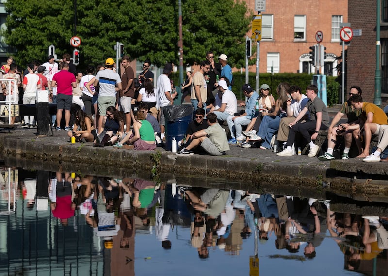 People enjoying after-work drinks outside McCafferty's at the Barge, in Dublin, on Friday.  Photograph: Sam Boal/Collins
