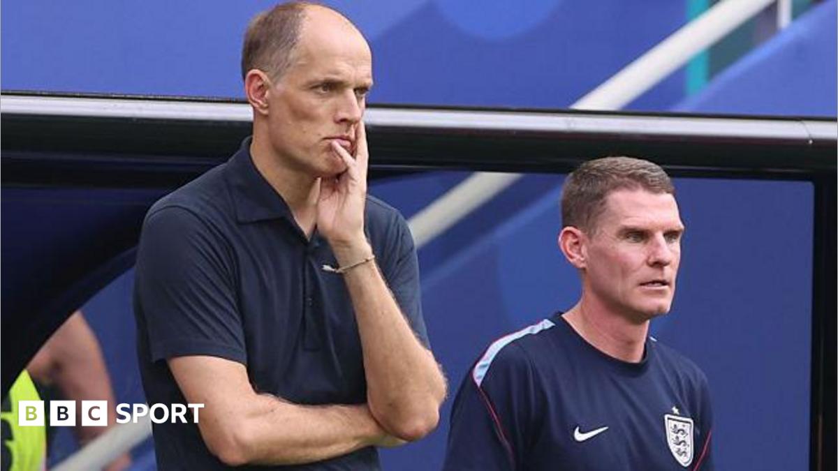 Anthony Barry and Thomas Tuchel watch a match from the stands